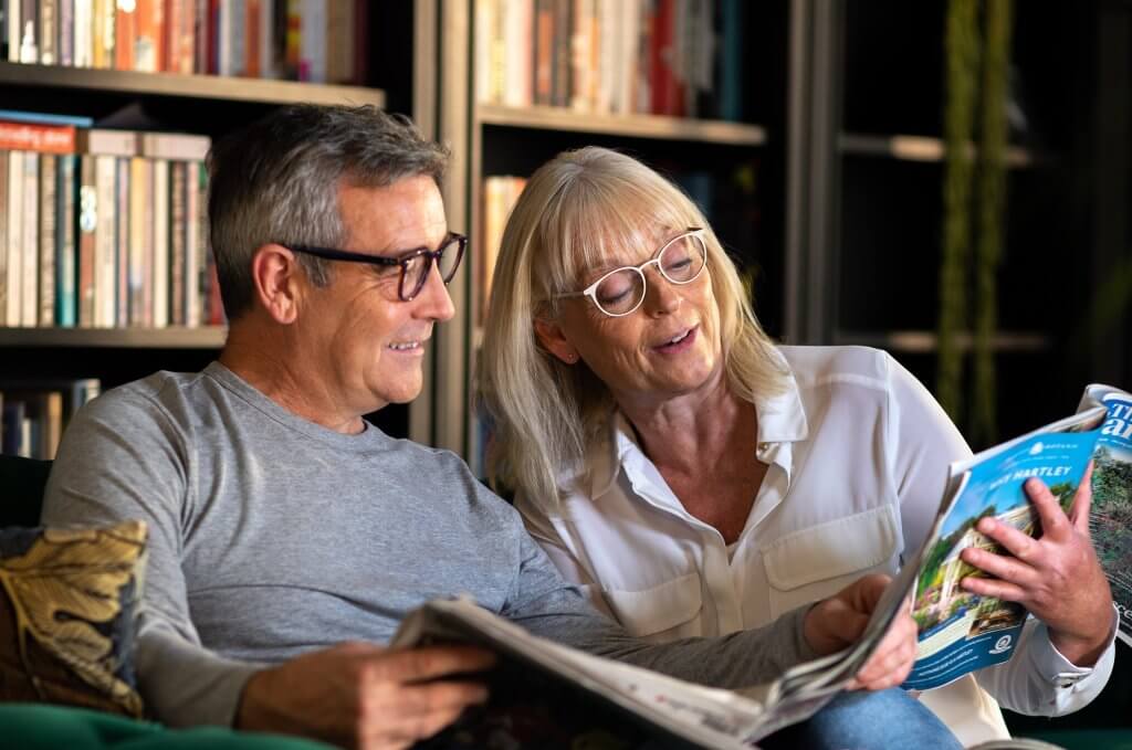 Couple reading a magazine