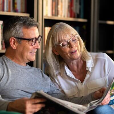 Couple reading a magazine