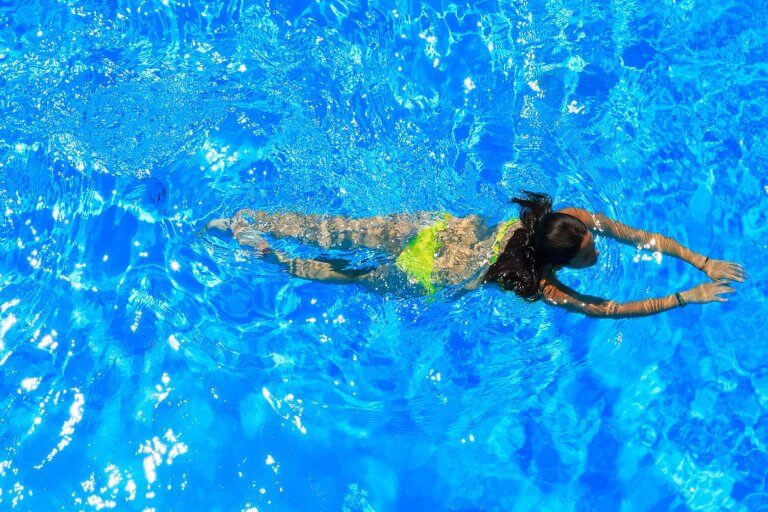 aerial-shot-of-lady-swimming