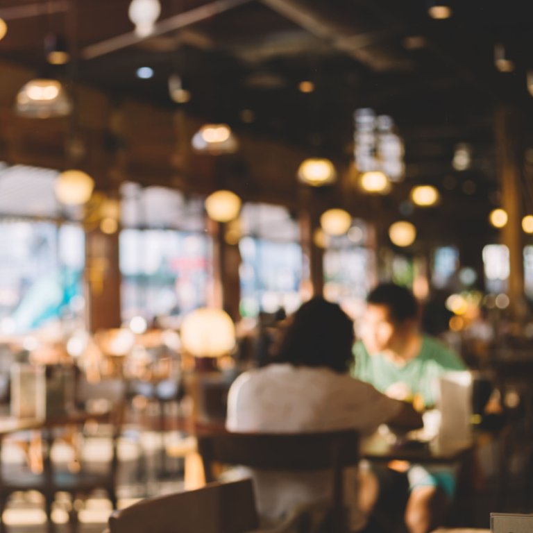 Blurry view of the interior of a restaurant.