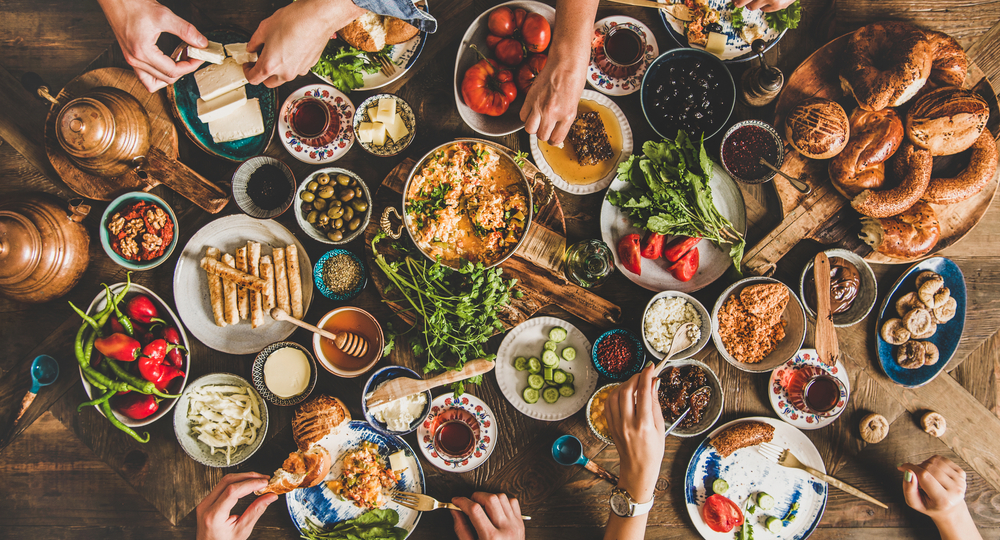 A table filled with food on plates.