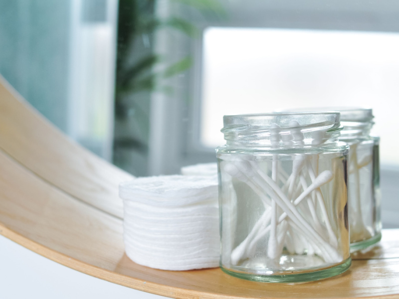 A jar of cotton swabs.