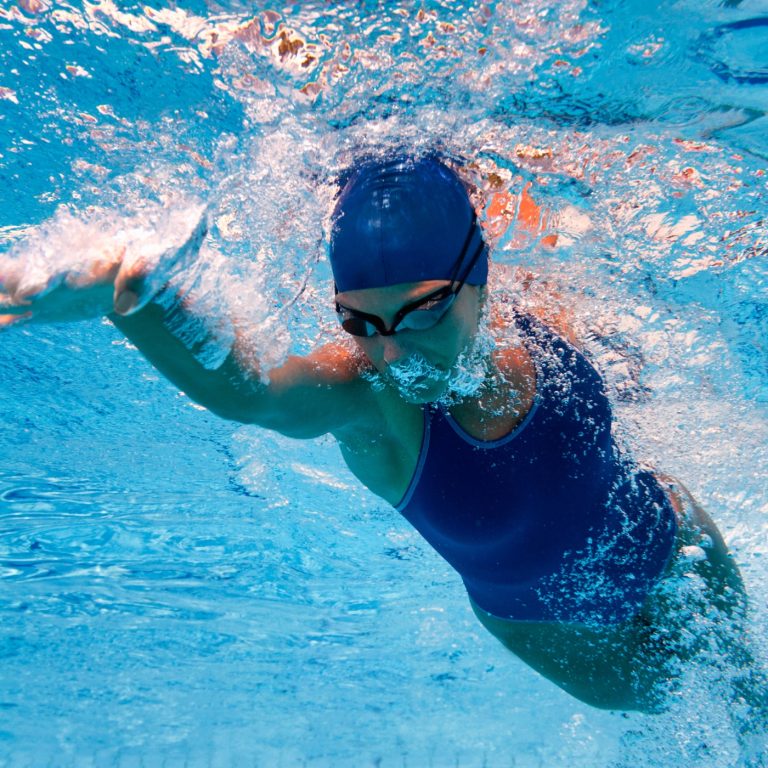 Front crawl swimmer from beneath.
