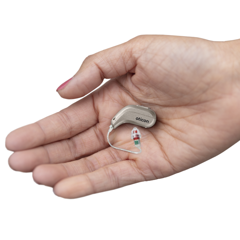 Oticon Intent hearing aids in a hand.