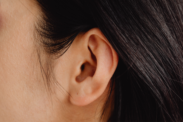 A close-up of a woman's ear.